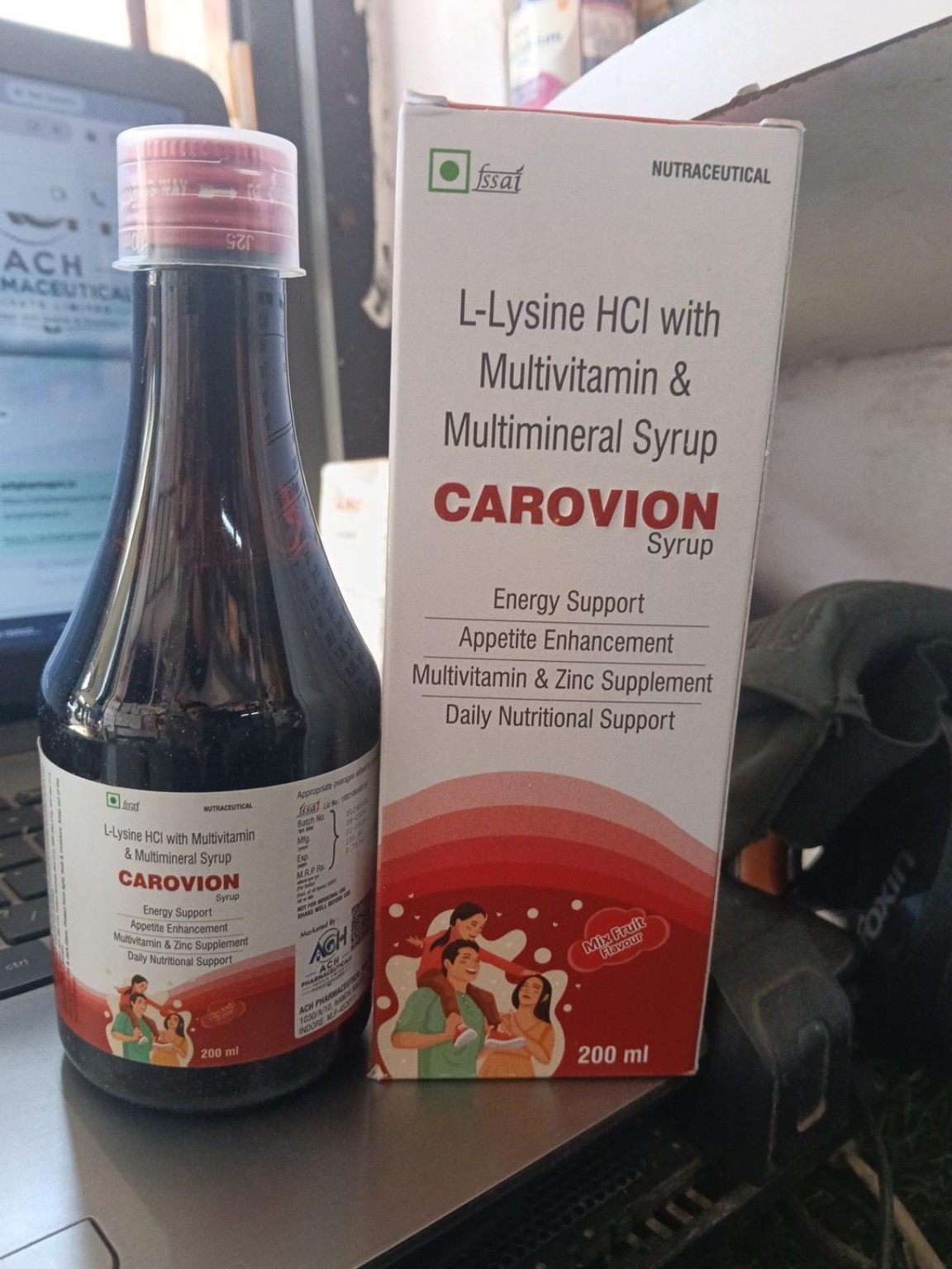 Actual Carovion Syrup 200 ml bottle and carton, front view